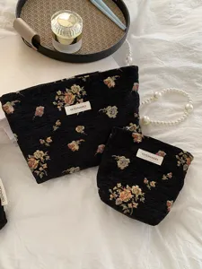 Vintage floral cosmetic bag set, large capacity fabric makeup pouch with golden woven details.