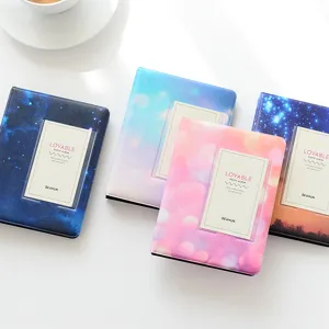 Colorful starry sky 3-inch mini Polaroid photo album, ticket and card storage book detail shot.