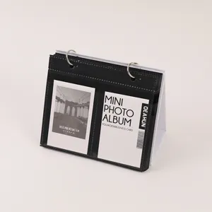 Desktop calendar style mini photo album for 3-inch Polaroid pictures and business cards holder.