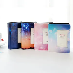 Mini 3-inch Polaroid photo album detail view showing colorful cover design and transparent pocket.