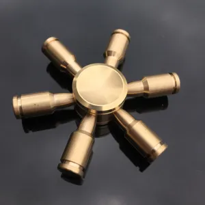 Brass fidget spinner toy, metal hand spinner for stress relief and focus. Detail view.