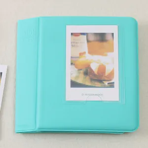 Mini polaroid photo album detail view showing candy color design and transparent front pocket.