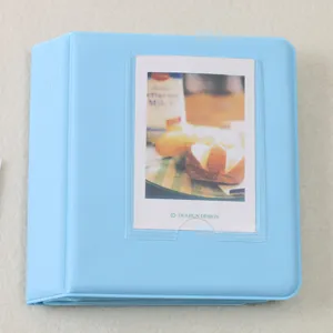 Mini light blue polaroid photo album with transparent cover pocket, 64 pockets sweet style.