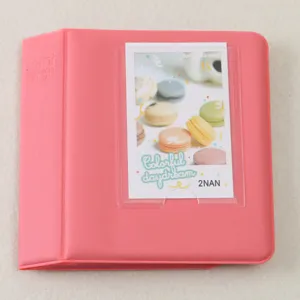 Pink mini photo album for instant pictures with 64 pockets candy color card holder detail view