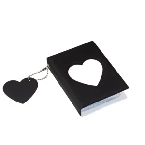 Mini 3-inch K-pop photocard holder album with heart cutout and cute pendant charm for collectible cards.