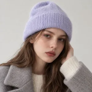 Close-up view of the cozy wool blend knitted beanie detail, soft texture and warm fit.