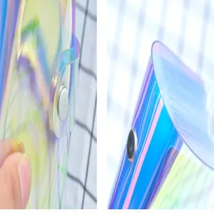 Close-up detail shot of holographic transparent card holder album showing texture and snap.