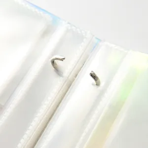Transparent holographic loose-leaf photo album binder detail closeup, clear PVC pocket page