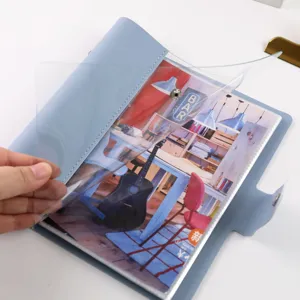 Blue PU leather loose-leaf photo album binder with clear pockets and snap button closure.