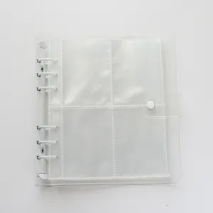 Clear PVC 6-ring photocard binder detail shot showing sturdy white metal rings and snap closure.