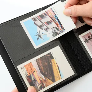Detail view of 3-inch polaroid photo album pocket page, showing easy storage for cards.