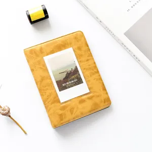 Vintage yellow 3-inch mini instant photo album, PU leather photo book holder for pictures.