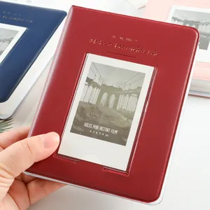 Close-up view of a 3-inch mini instant photo album pocket with clear display window.