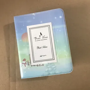 Detail view of the 3-inch mini photo album card collector book with starry sky winter design.