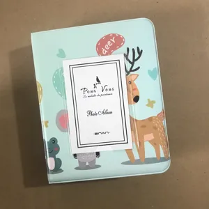 Close-up detail of the cute cartoon deer mini 3-inch photo album card holder pocket.