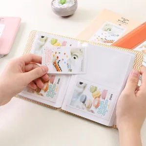 Instax mini photo album 3 inch Polaroid picture holder cute pocket book detail shot.