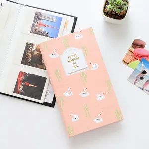 Pink self-adhesive photo album for 3-inch polaroid pictures, cute swan cover design.