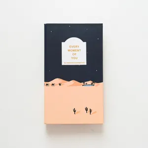Detailed view of the desert themed photo album cover, featuring nice design and clear text.