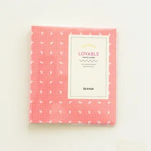 Cute pink polka dot mini photo album for 3-inch polaroid pictures and small cards.