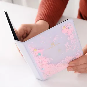 Mini álbum de fotos de 3 pulgadas con lentejuelas rosa y cubierta de PVC transparente.
