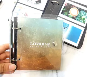 Mini loose-leaf photo album with clear cover for 3 4 5 inch pictures and card storage.