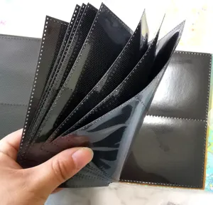 Detail view of loose leaf PP photocard album pages black pocket holder storage book interior pages.
