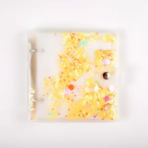 Clear PVC loose-leaf photo album with floating yellow glitter sequins and cute snap button.