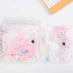 Transparent glitter loose leaf photo album and passport holder set for collectors.