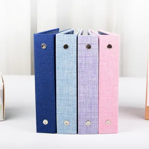Colorful ring binder photo album set with fabric cover, perfect for photo storage.