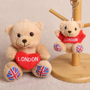 Cute London souvenir teddy bear plush toy with red heart and hoodie, soft gift doll for kids.