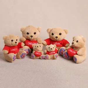 Cute sitting teddy bear plush toys in various sizes, featuring London souvenir hoodies and hearts.