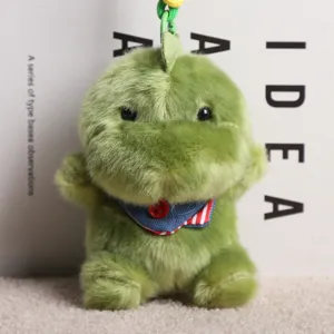 Süßer grüner Plüsch Dinosaurier Puppe Schlüsselanhänger mit gestreiftem Schal Tasche Ornament.