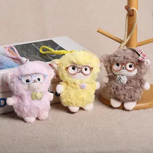 Cute fluffy sheep plush keychain toy with glasses, soft stuffed animal bag charm pendant detail.