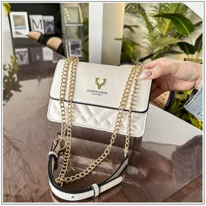 Elegant white quilted shoulder bag with chain strap and chic deer metal logo for women style.