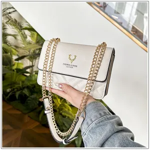 Detail view of the elegant quilted chain shoulder bag, showcasing fine stitching and hardware.