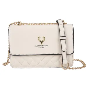 Elegant quilted white shoulder bag with gold chain strap, stylish women crossbody handbag.