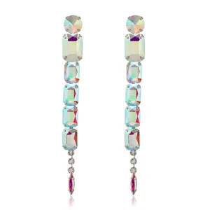 Detailed shot of long dangling iridescent crystal drop earrings, sparkling multi-stone fashion jewelry.