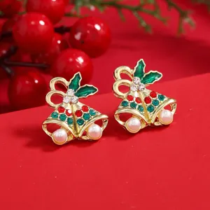 Pendientes de botón campana estrás perla, joyería fantasía Navidad detalle macro foto.
