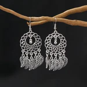 Bohemian retro silver dreamcatcher leaf tassel earrings for women fashion jewelry accessory.