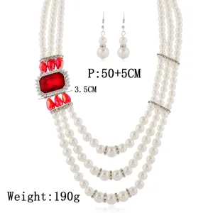Elegante meertraps parelketting set met rode kristallen hanger statement bruidssieraden