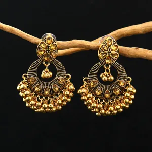Vintage gold Indian ethnic tassel earrings with crystal gemstones for women, boho drop jewelry.