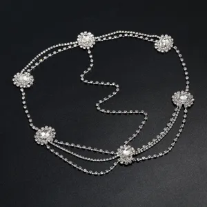 Close-up detail of silver rhinestone multi-layer head chain for women party hair decor.