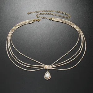 Close-up detail of a stunning multi-layer rhinestone forehead chain with crystal teardrop.