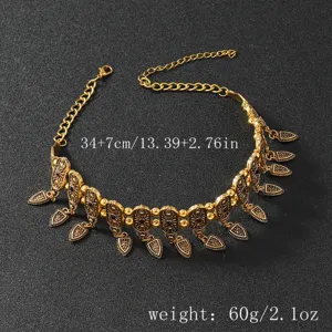 Detailed view of retro alloy carved choker necklace with delicate charms and adjustable chain.