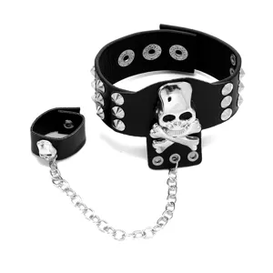 Punk rock bracelet en cuir noir avec rivets crane et chaine de bague de doigt style gothique.