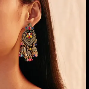 Vintage Indian boho jhumka dangle earrings with colorful beads and enamel drop details.
