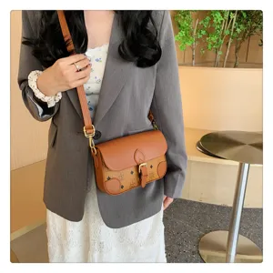 Retro color-block women's shoulder crossbody bag with unique monogram print and chic buckle detail.