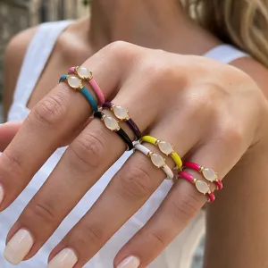Colorful enamel teardrop rings set, adjustable open gold plated fashion jewelry detailed view.