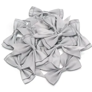 Silver satin ribbon bows for DIY crafts, gift wrapping, hair clips, and clothing accessories.