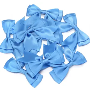 Blue satin ribbon bows for DIY craft, gift wrapping, clothing and doll accessories.
